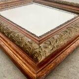 Old mirror in oak and gilded wood early 20th century beveled glass