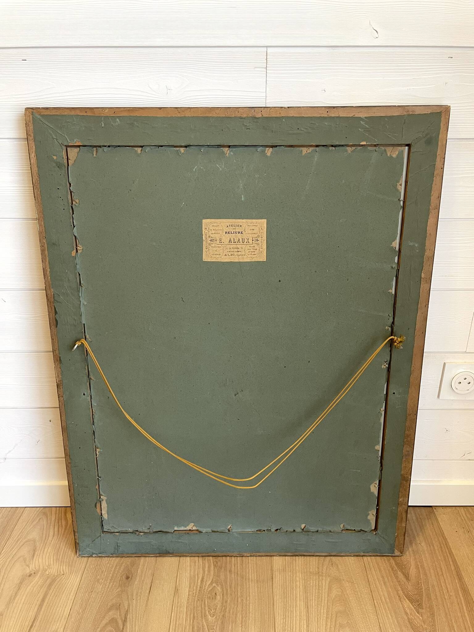 Large gilded antique mirror with moulding in the Napoléon III style.