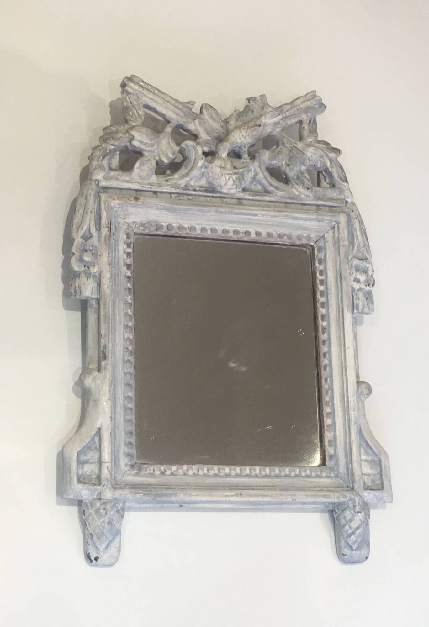 Louis XVI Style Mirror in Carved Wood with Grey Patina and Dove Pediment