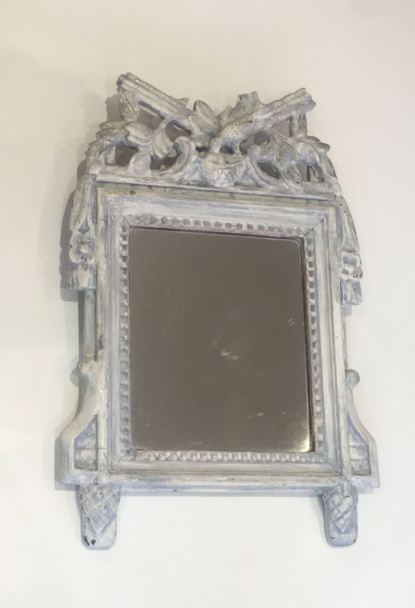 Louis XVI Style Mirror in Carved Wood with Grey Patina and Dove Pediment