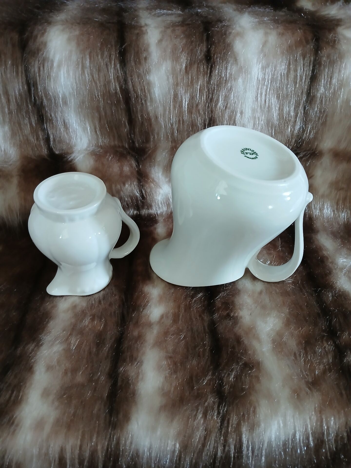 2 antique pitchers in white earthenware