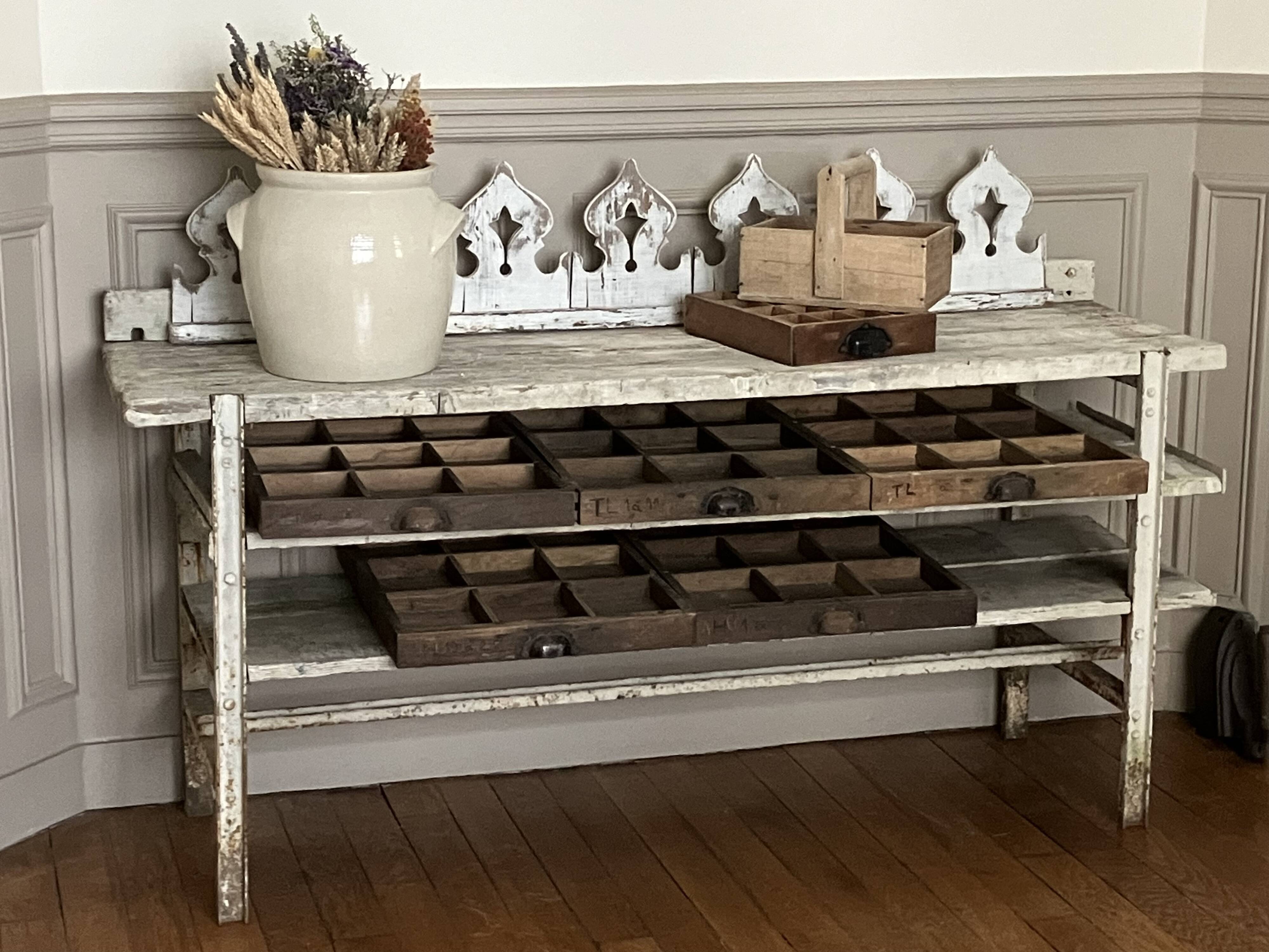 Old workbench, a piece of wooden and metal furniture.