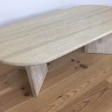Oval coffee table in travertine