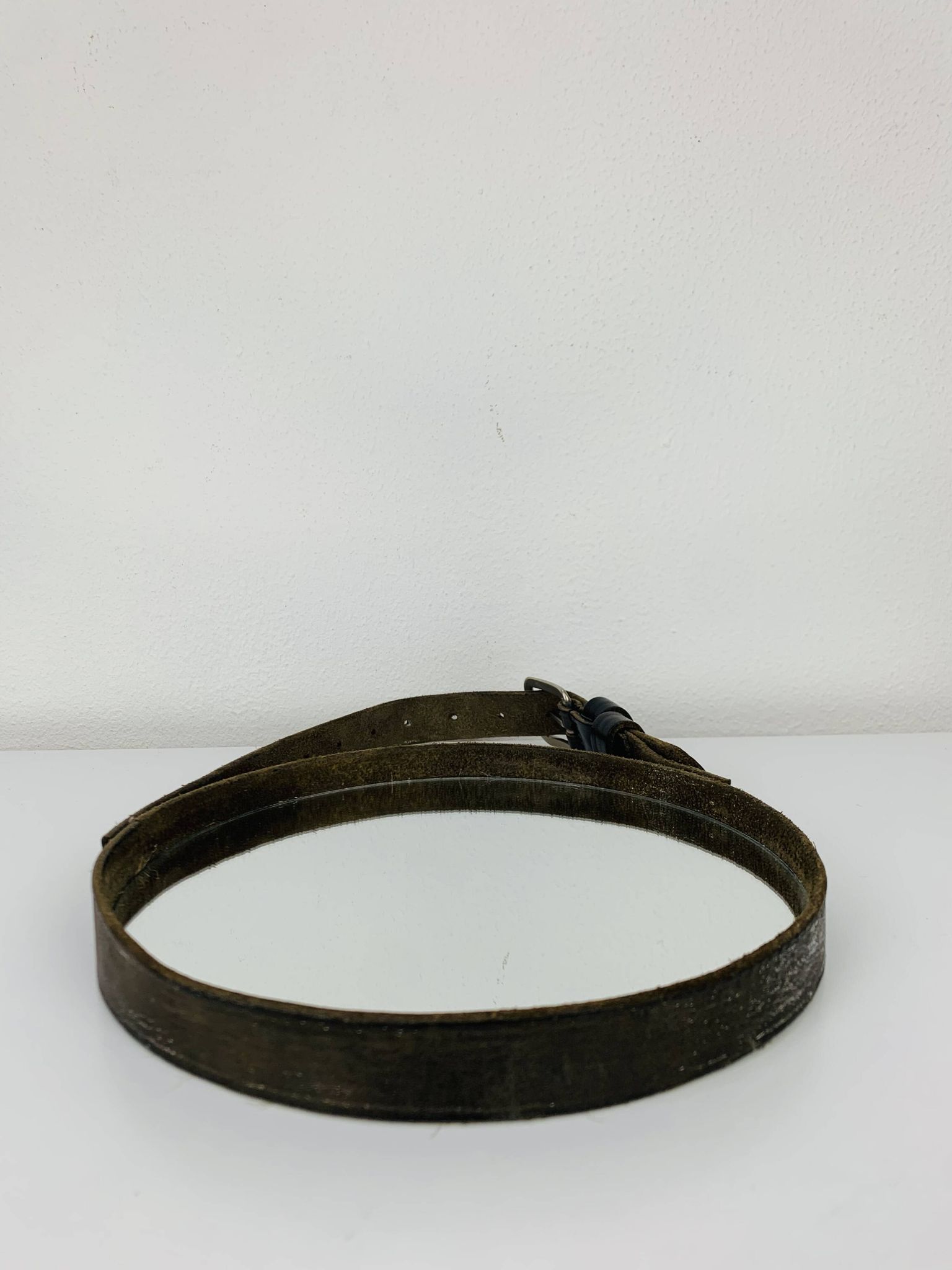 Mirror with handmade leather strapping