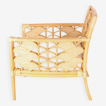 Pair of rattan armchairs with fan motifs