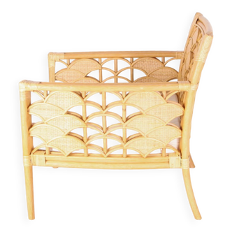 Pair of rattan armchairs with fan motifs