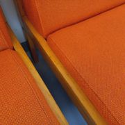 Set of 2 vintage Baumann armchairs in orange fabric and wood from the 80s