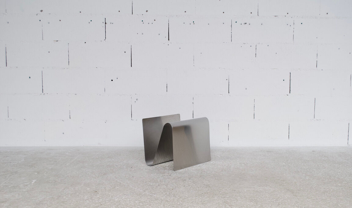 Magazine holder anonymous work 70' brushed steel