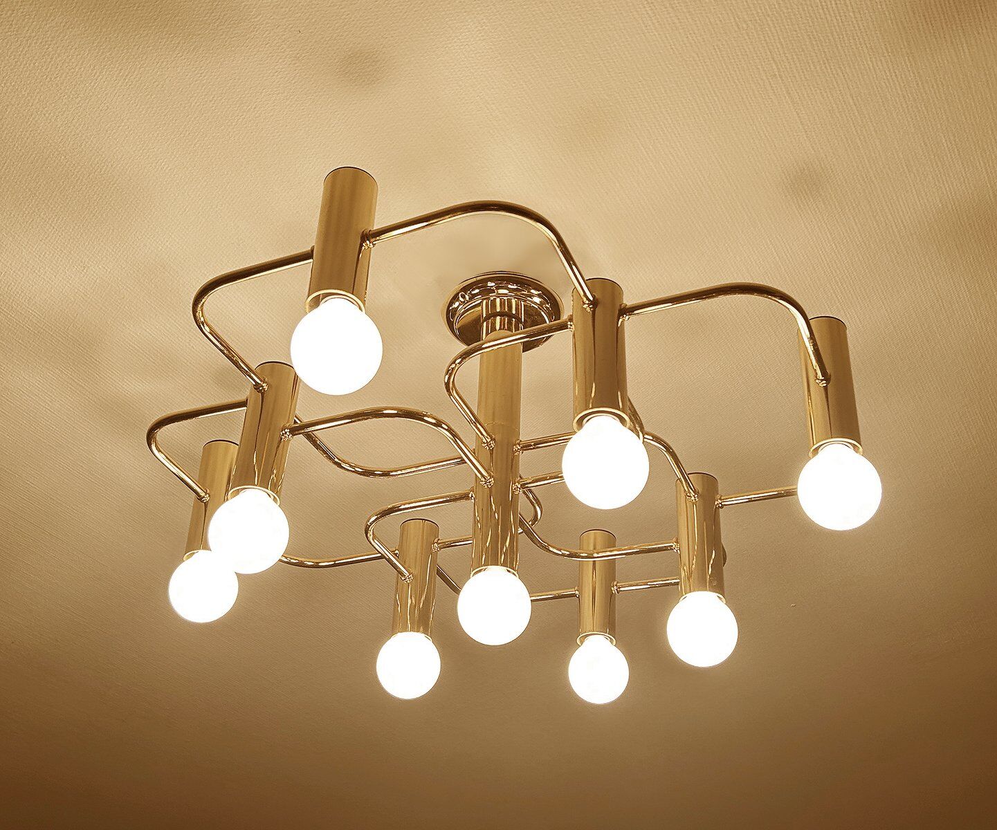 Large Space Age gilded ceiling light from Leola