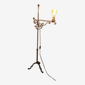 Wrought iron adjustable floor lamp in a somewhat medieval style, from the 1960s