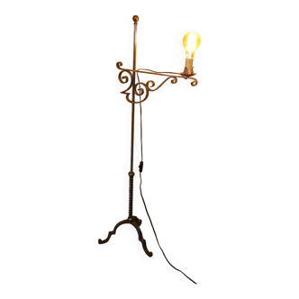 Wrought iron adjustable floor lamp in a somewhat medieval style, from the 1960s