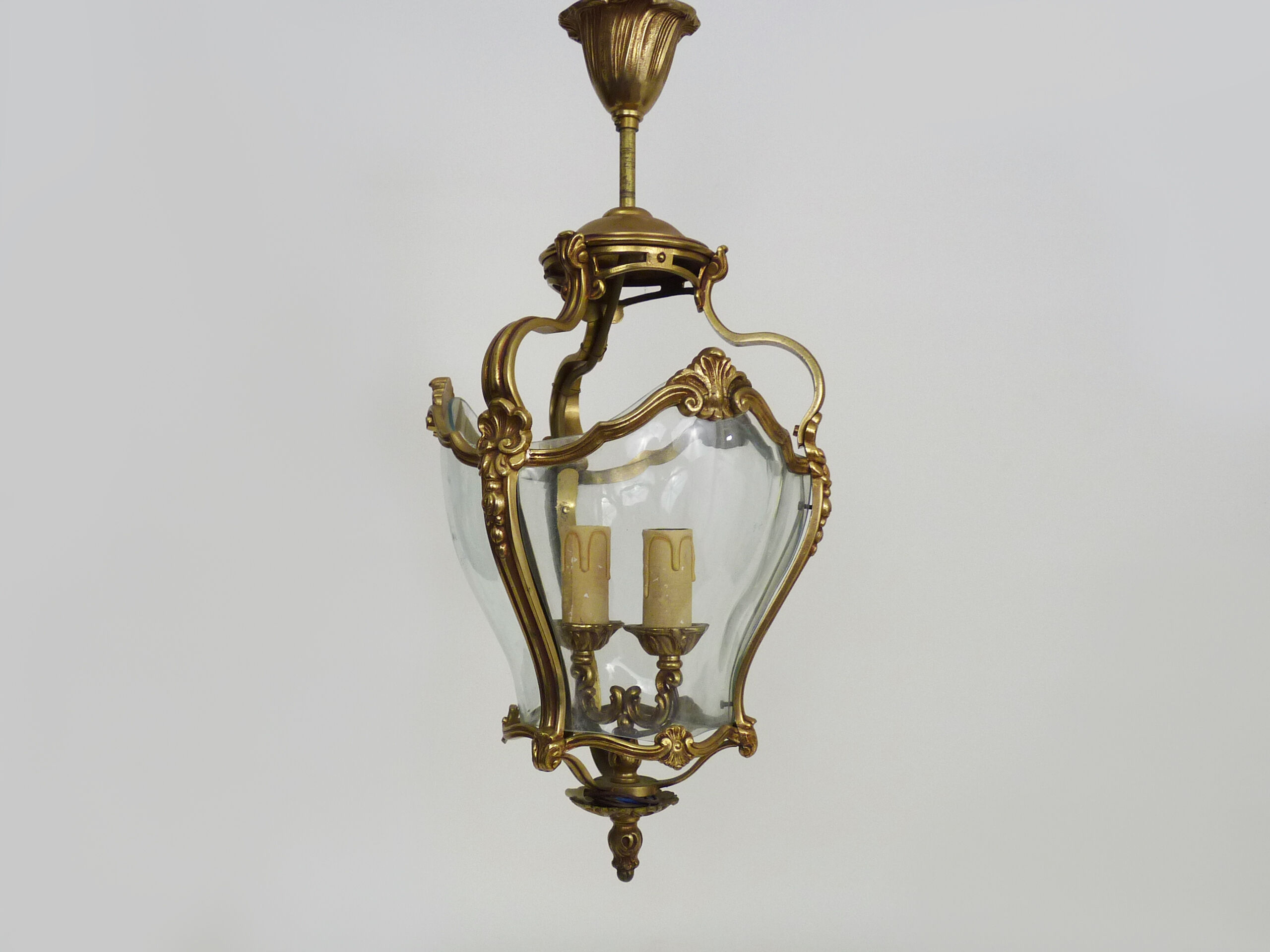 Old lantern with 3 faces, chandelier in gilded bronze and curved glass. Year 60