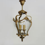 Old lantern with 3 faces, chandelier in gilded bronze and curved glass. Year 60