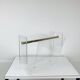 Plexiglas and brass magazine rack, David Lange, 1970s