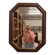 Miroir vintage hexagonal avec cadre en ronce de bois