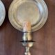 Pair of vintage wall sconces in textured brass, brutalist style.