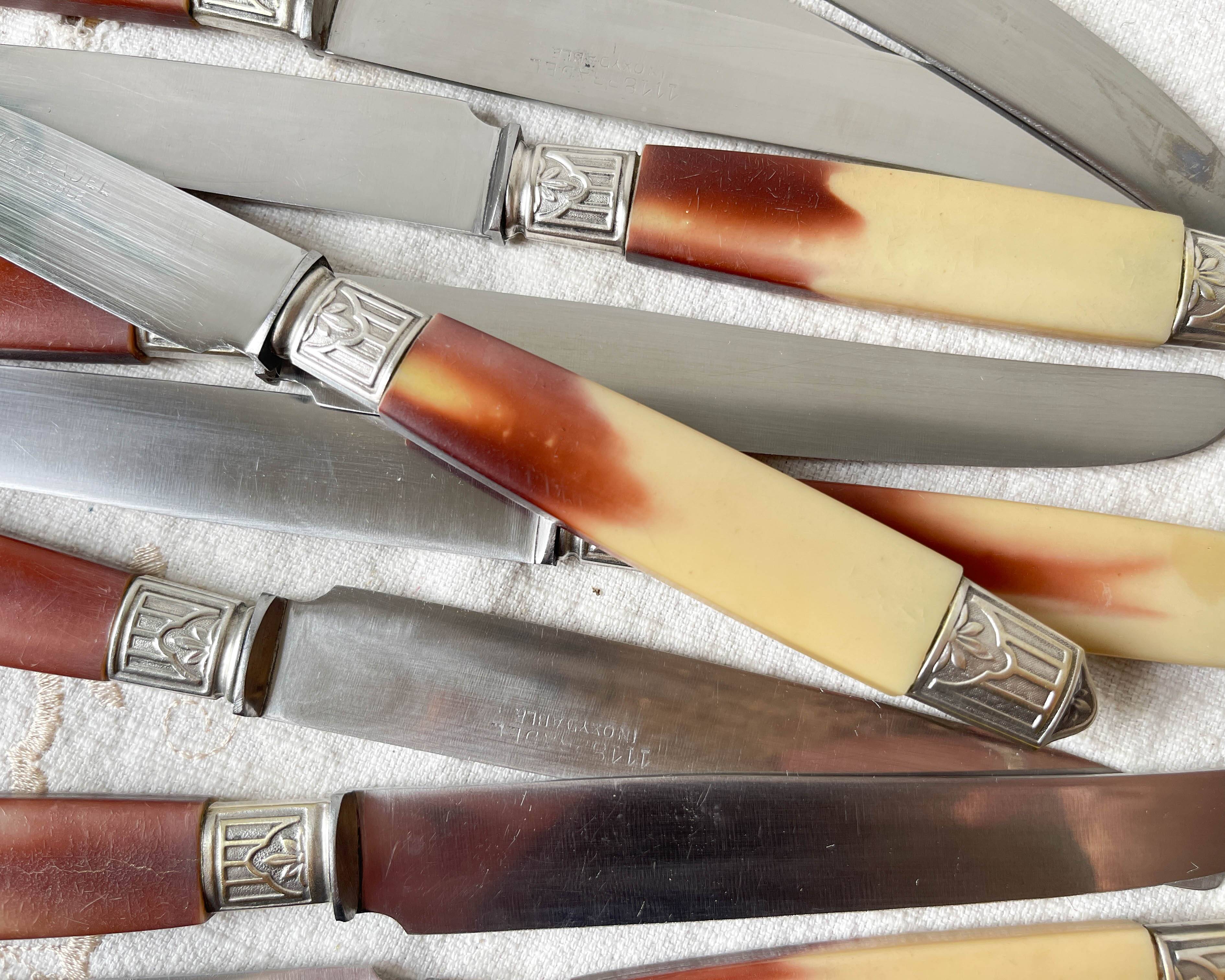12 vintage Pradel stainless steel bakelite knives