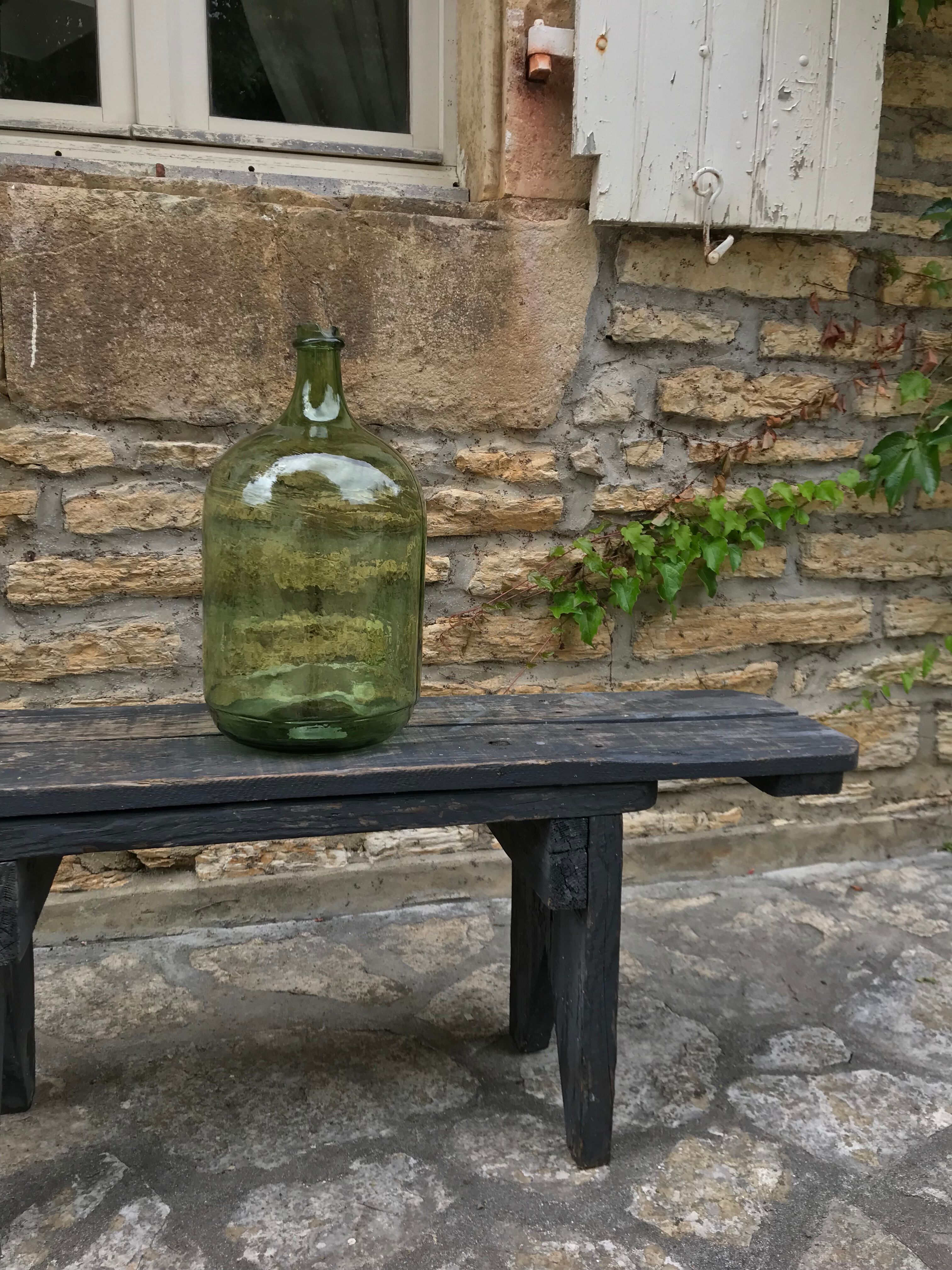 Green and oval demijohn
