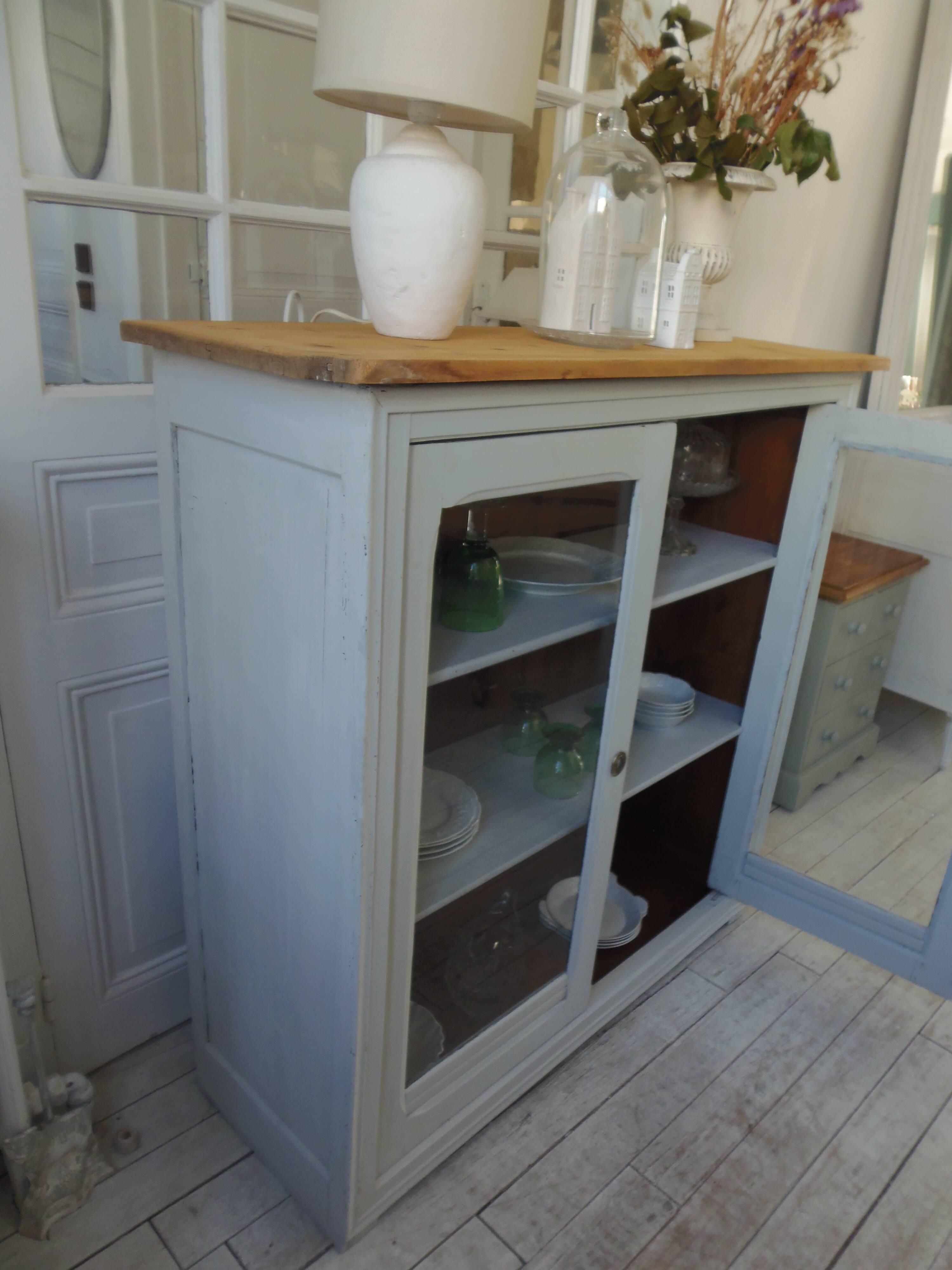 Display case, old shallow sideboard re-enchanted in cloud gray.