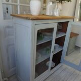 Display case, old shallow sideboard re-enchanted in cloud gray.
