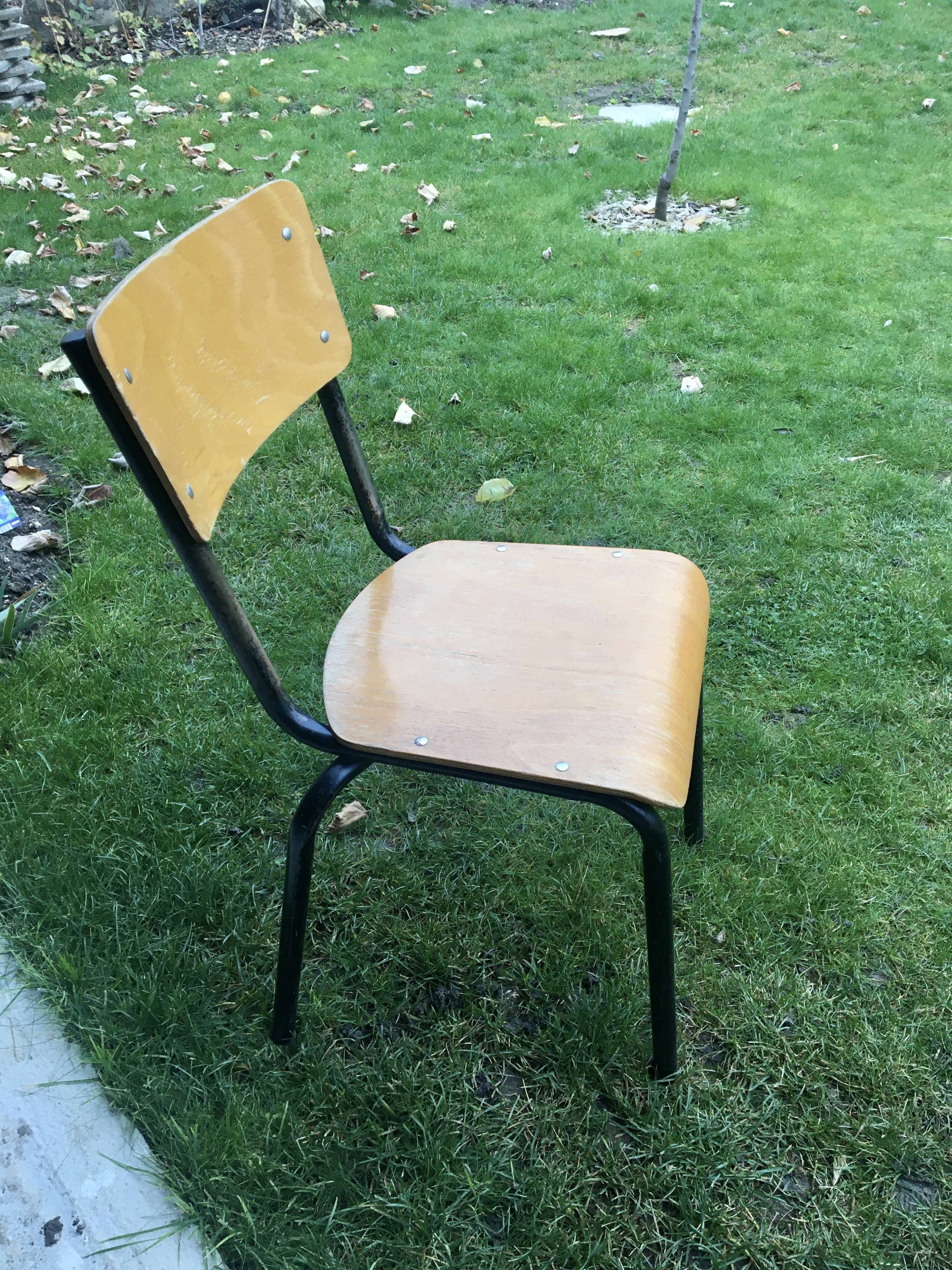 Vintage beech school chair and black steel foot