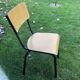Vintage beech school chair and black steel foot