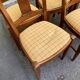 6 Syriel solid cherry wood dining chairs with yellow fabric.