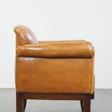 Restored antique Art Deco sheep leather armchair