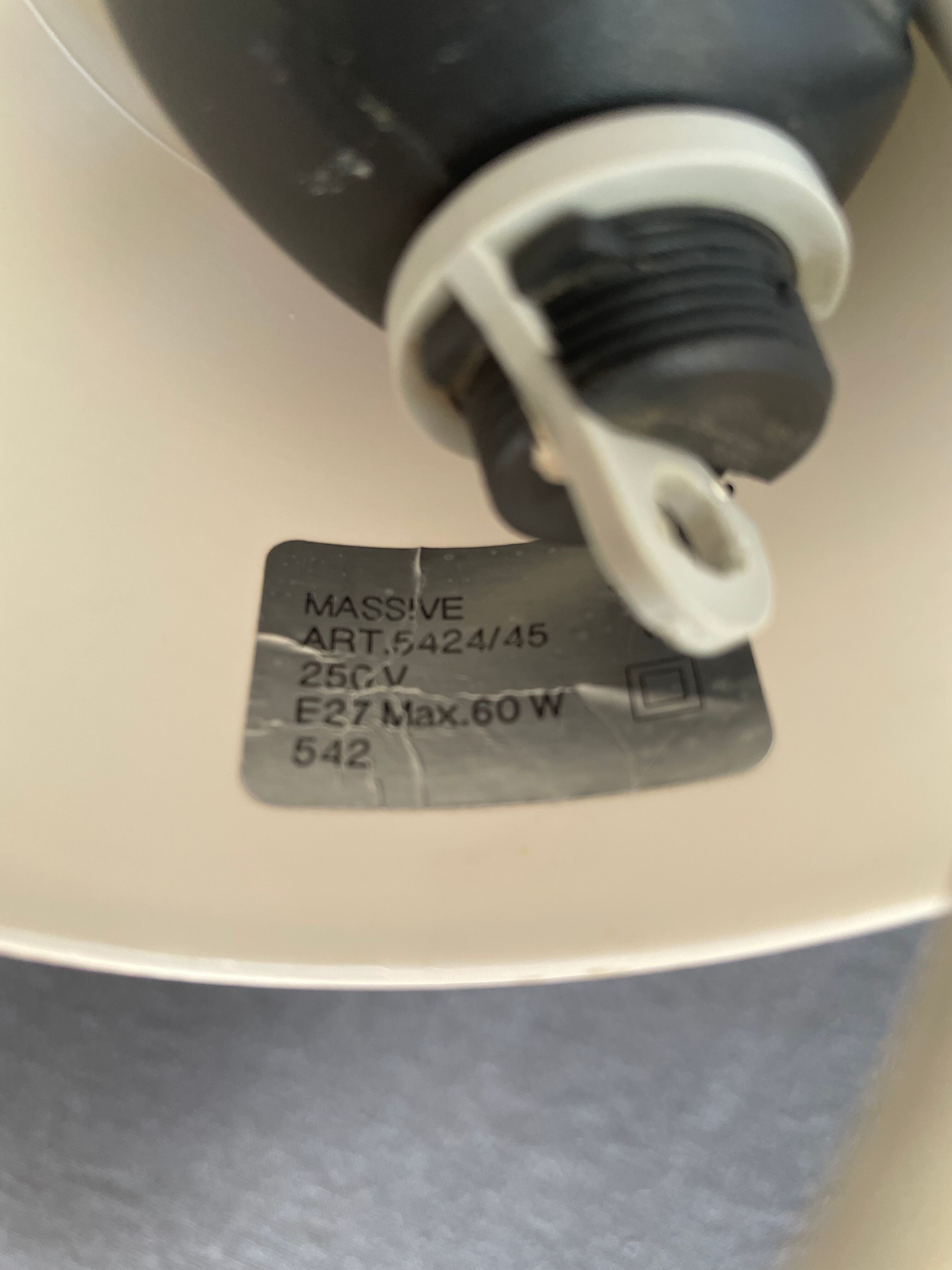 Suspension of the 80s in perforated white metal