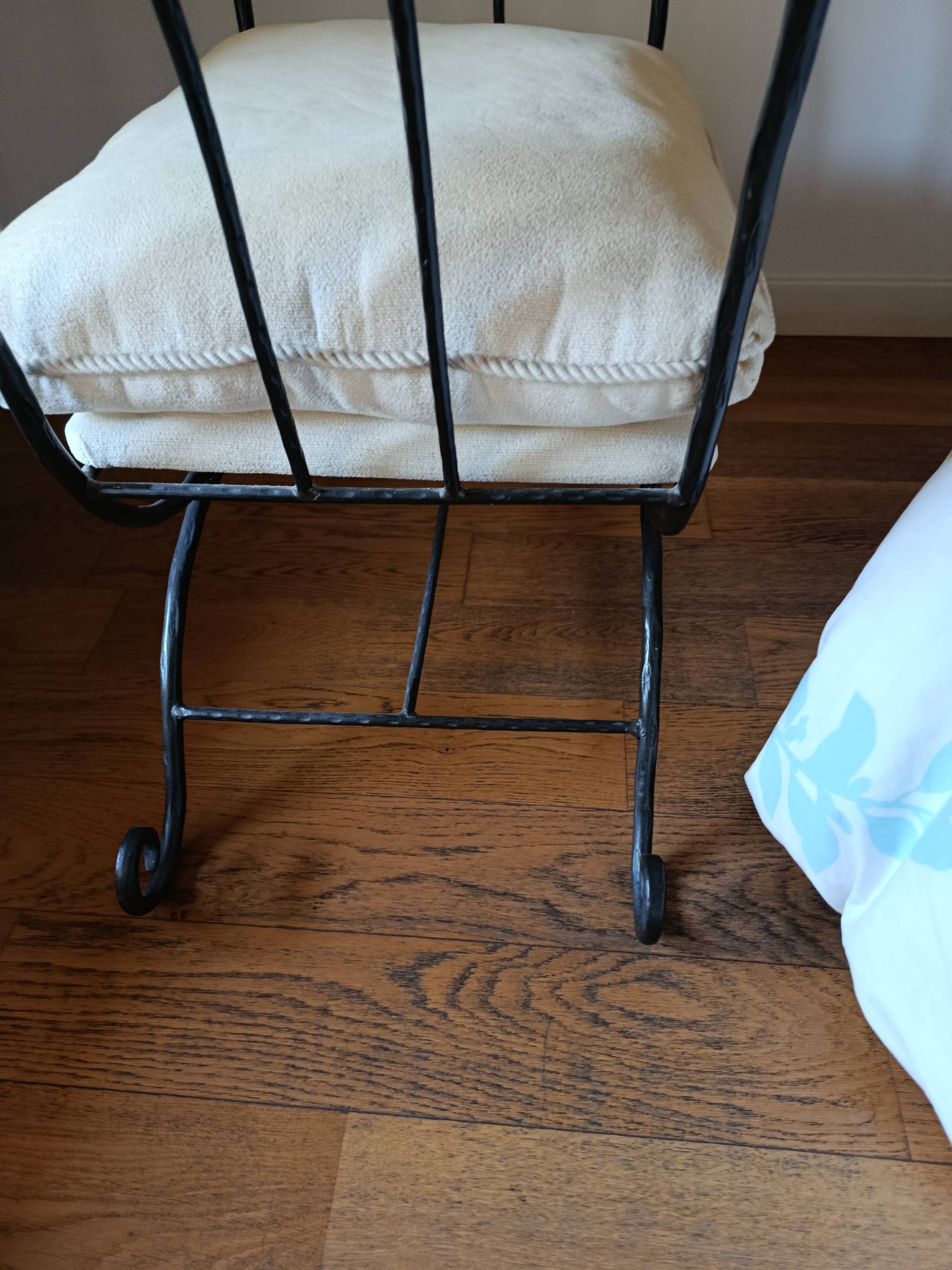 Artistic wrought iron pouf design