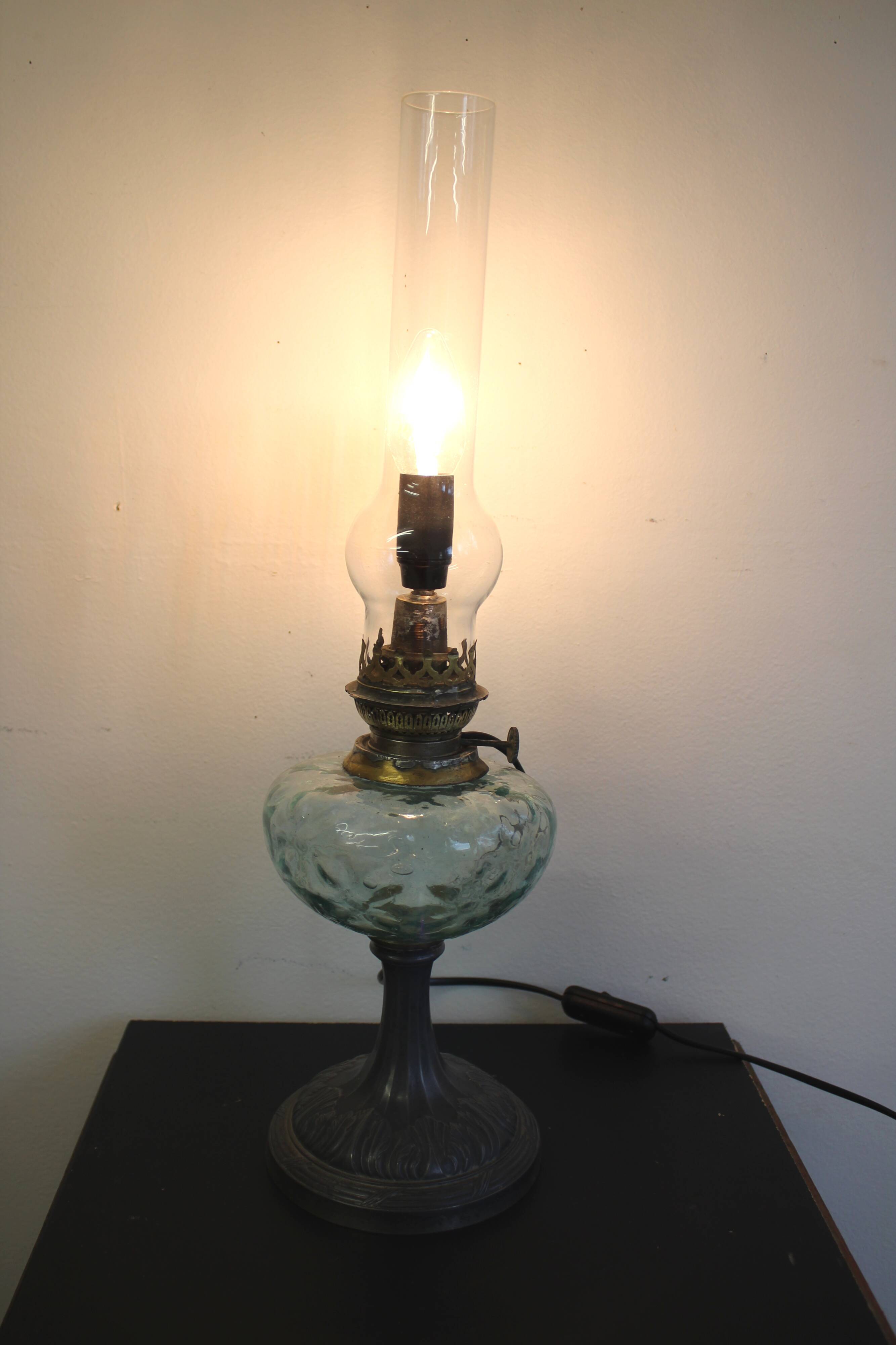 Oil lamp transformed into a bedside lamp