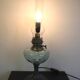 Oil lamp transformed into a bedside lamp