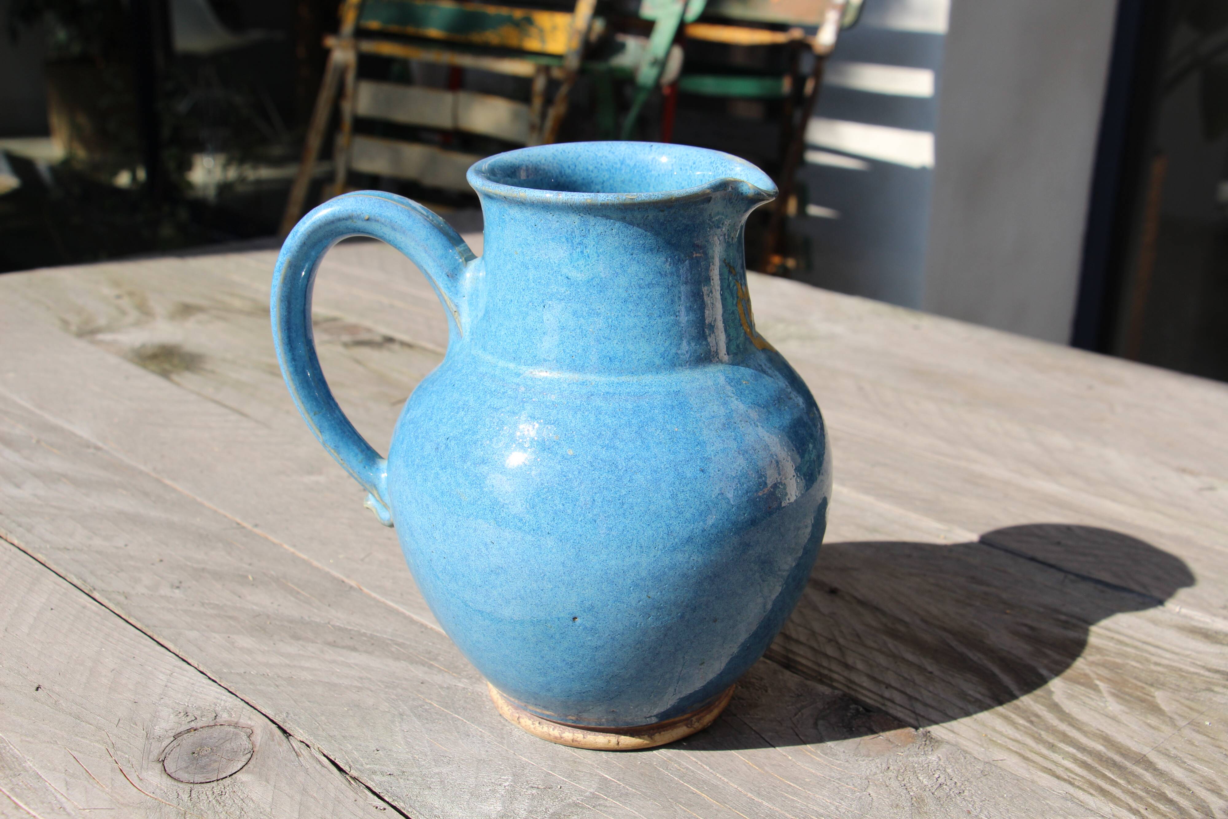 Blue ceramic pitcher
