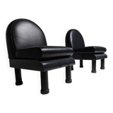Black leather loungers , 1980.