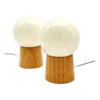 Pair of lamps with wooden base and glass globe, 1970s