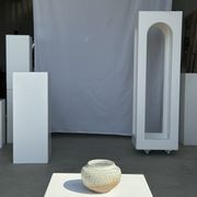 Small white ball vase tight neck in glazed speckled ceramic