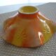 Yellow and orange ceramic salad dish