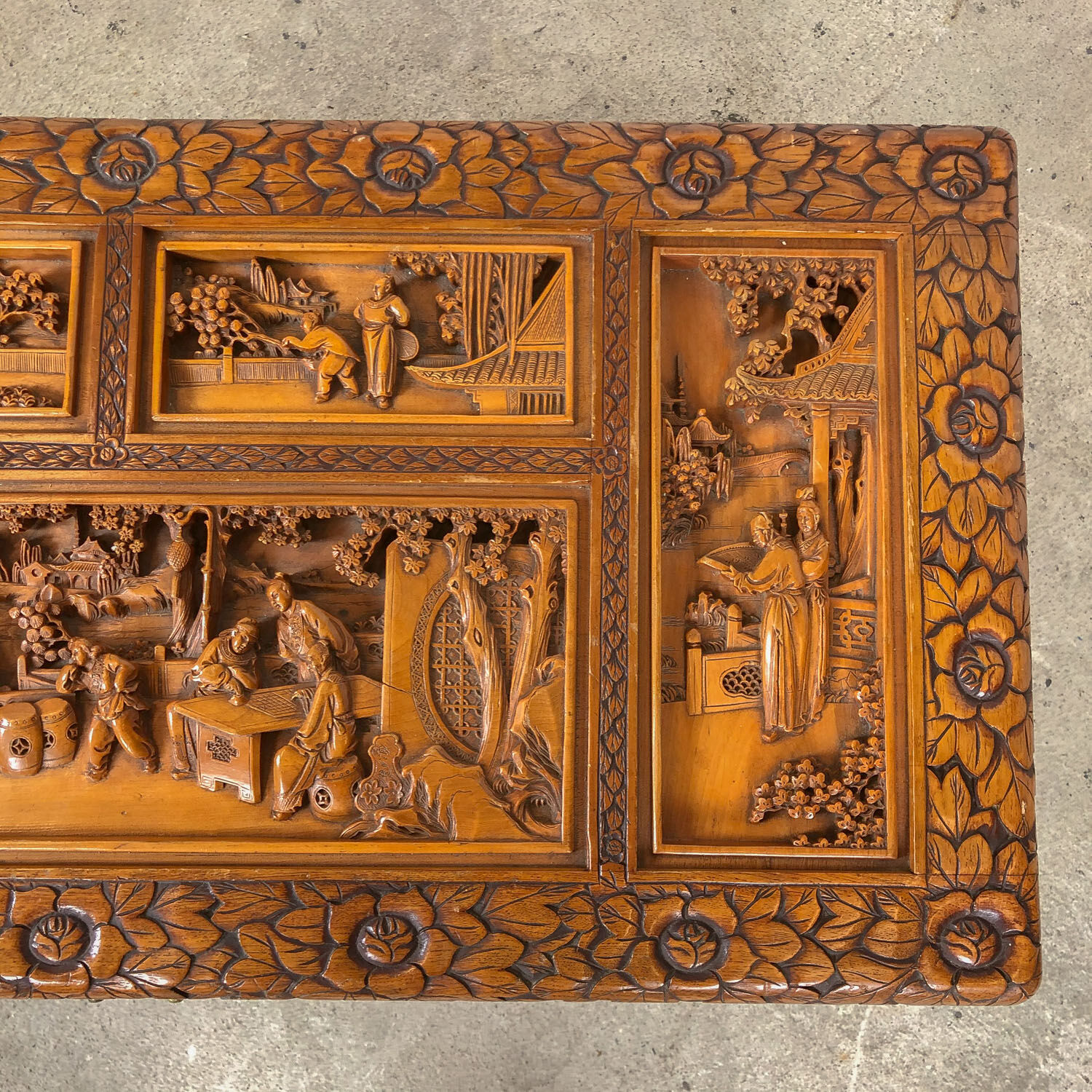 Vintage Chinese carved camphor wood chest on claw feet