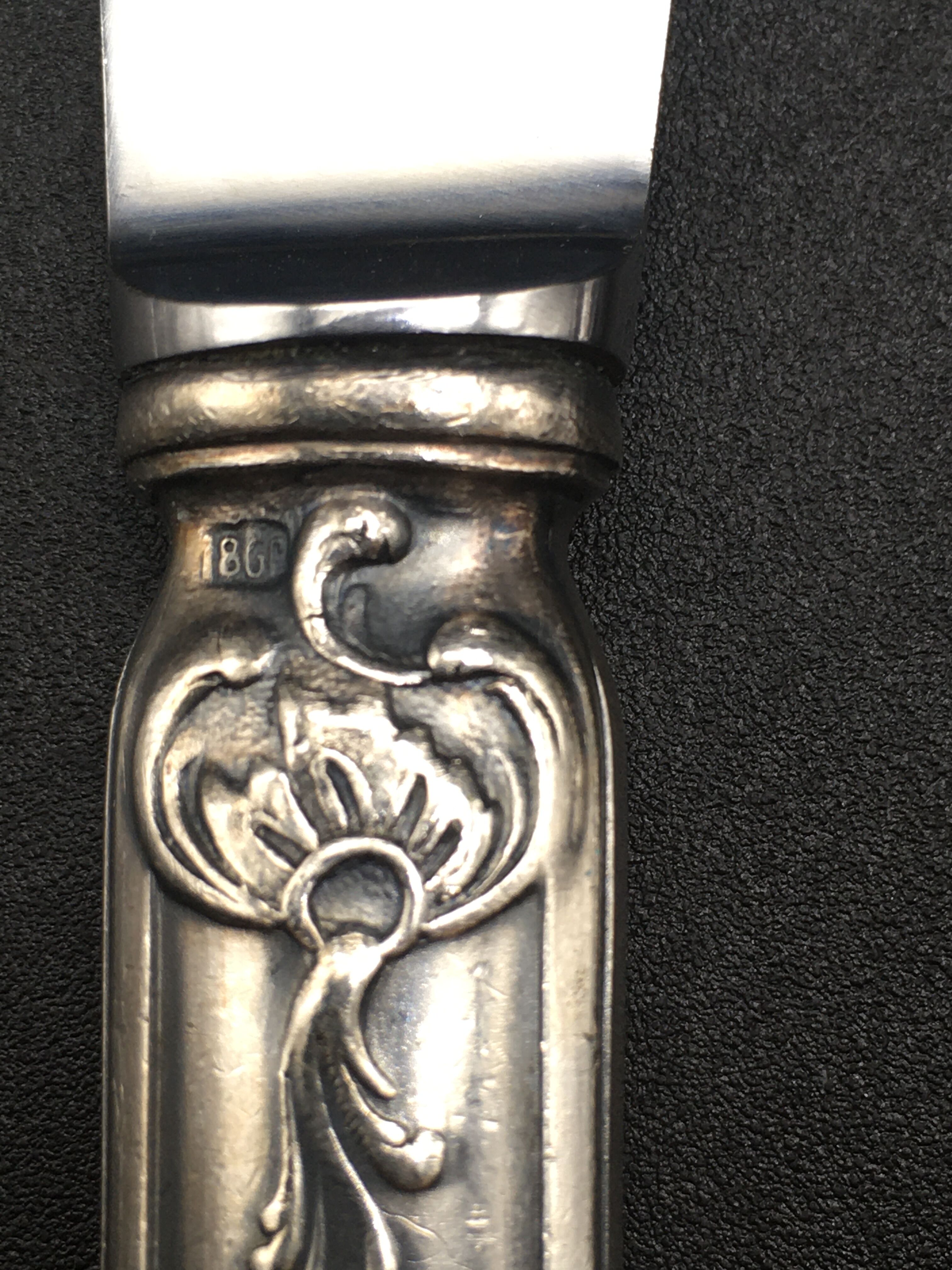 12 silver metal table knives model Rocaille