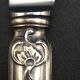 12 silver metal table knives model Rocaille
