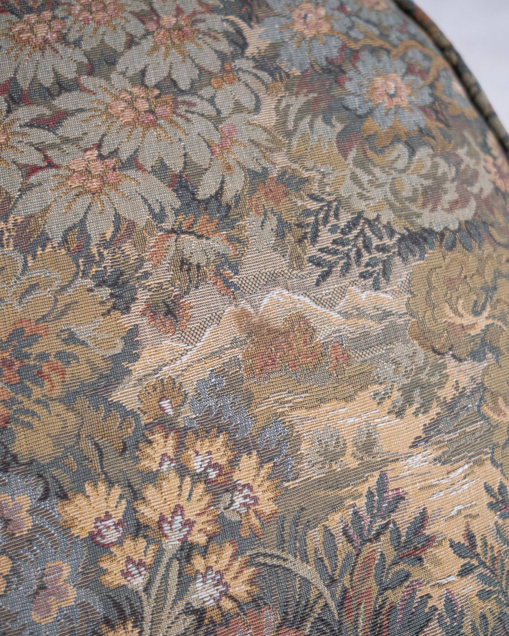 Upholstered pouf in verdure tapestry style, France, late 19th century.