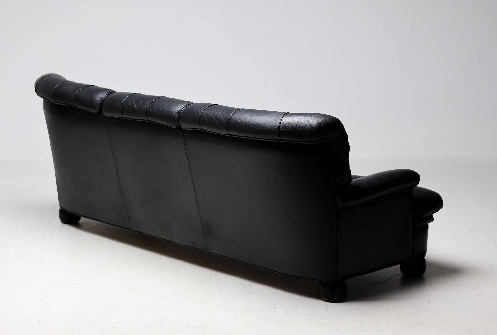 Three-seater sofa "Jupiter" in black leather by Arne Norell, Sweden, 1960.