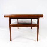 Coffee table with shelf in teak of danish design from the 1960s.