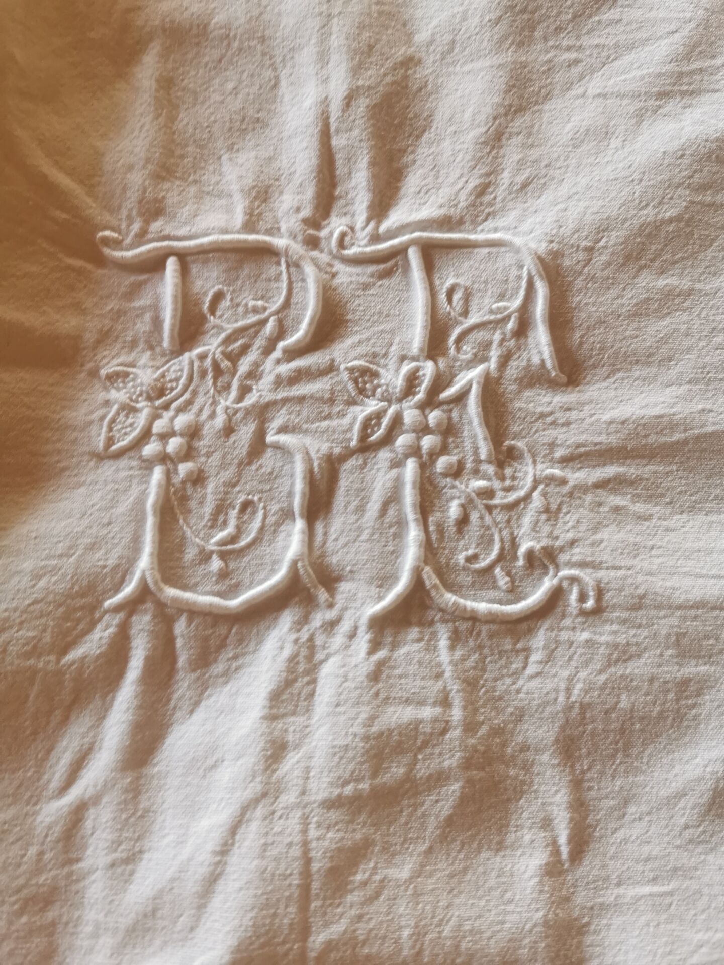 Antique monogrammed fabric