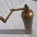 Oriental brass pepper mill