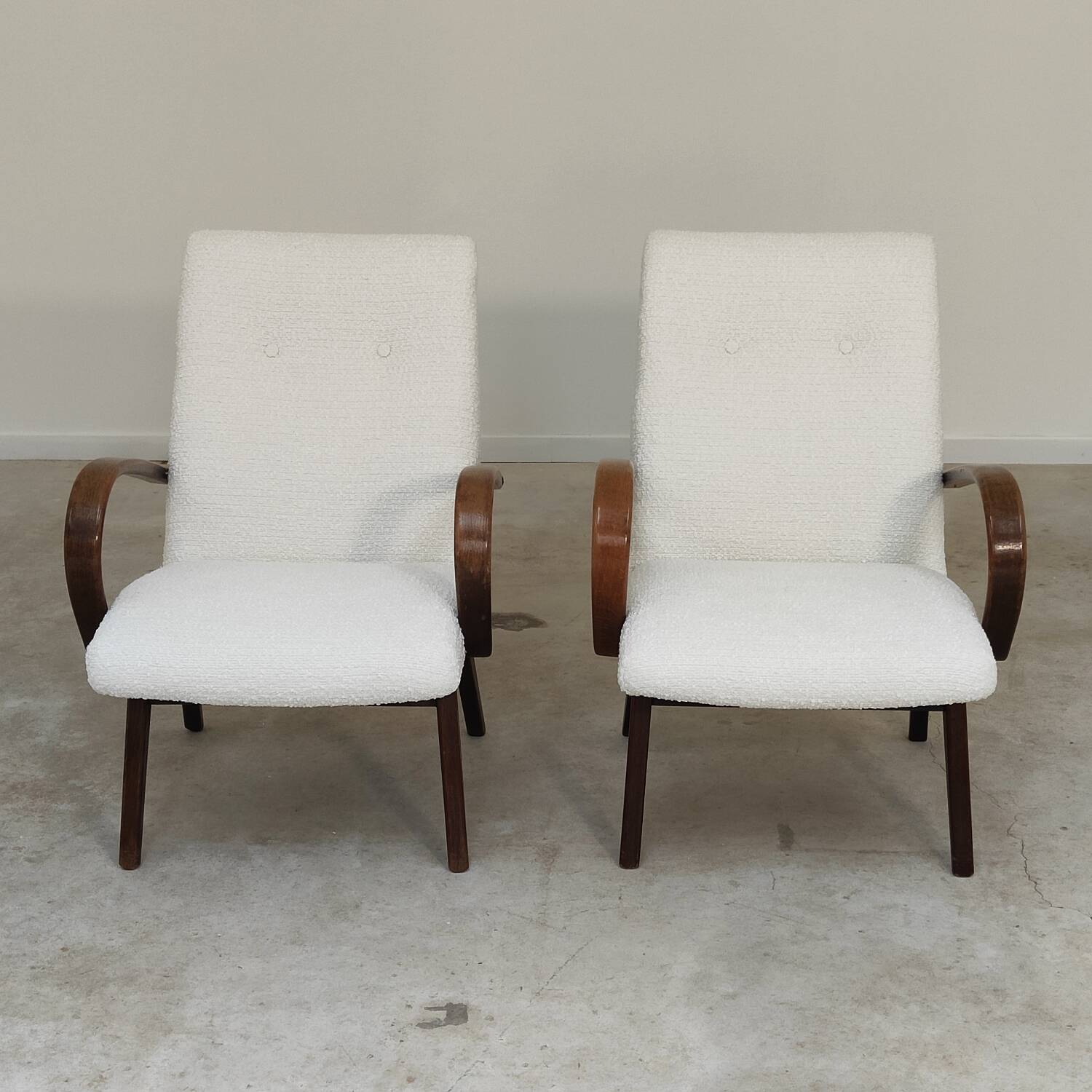 Pair of Jaroslav Smidek armchairs for Ton Bystrice, restored with white boucle, 1960.