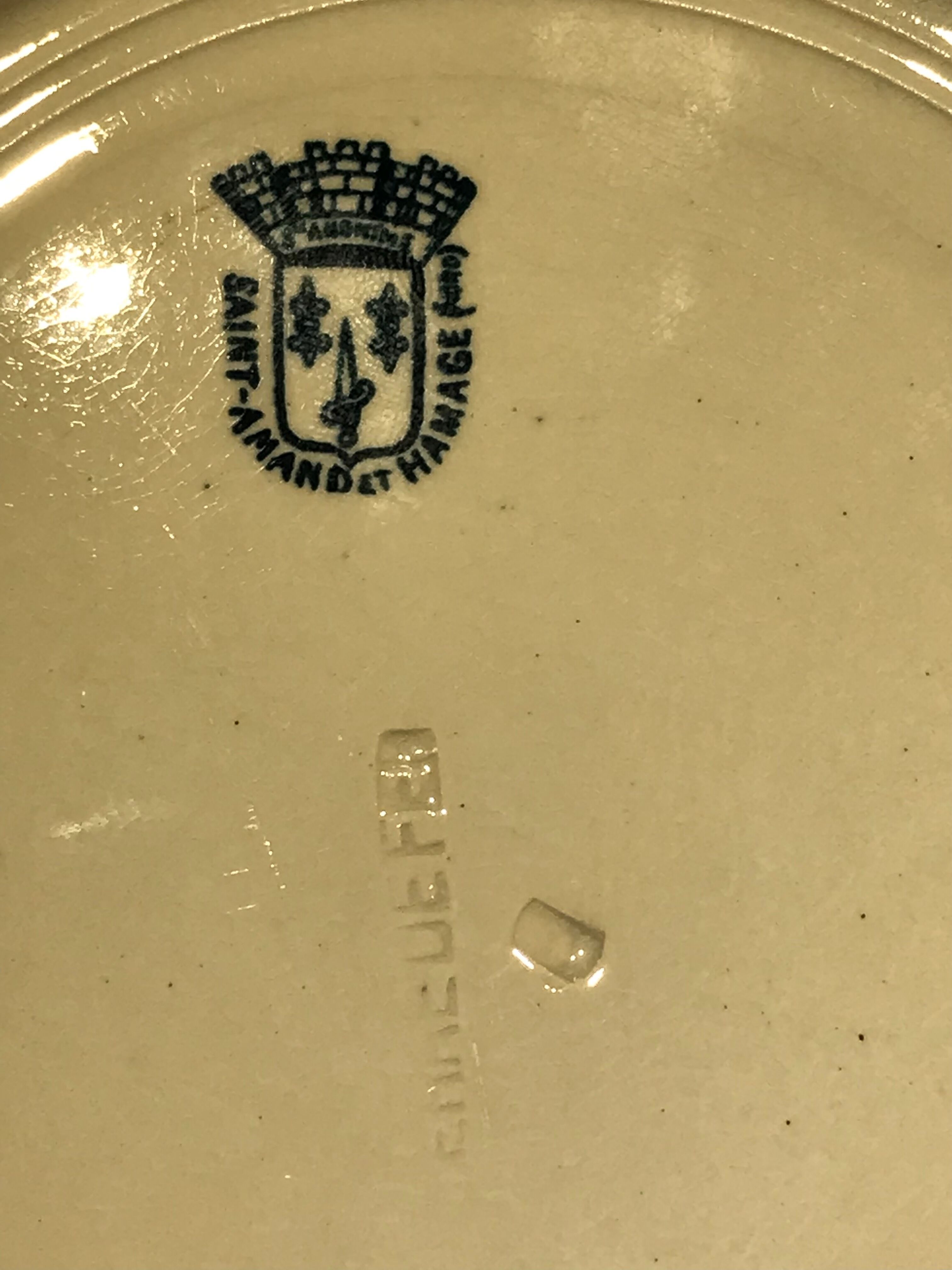 Flat plates (x12) iron earth. St Amand & Hamage.