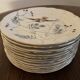 13 decorative plates with hummingbird design in fine earthenware by Mouzin Lecat, 19th century.