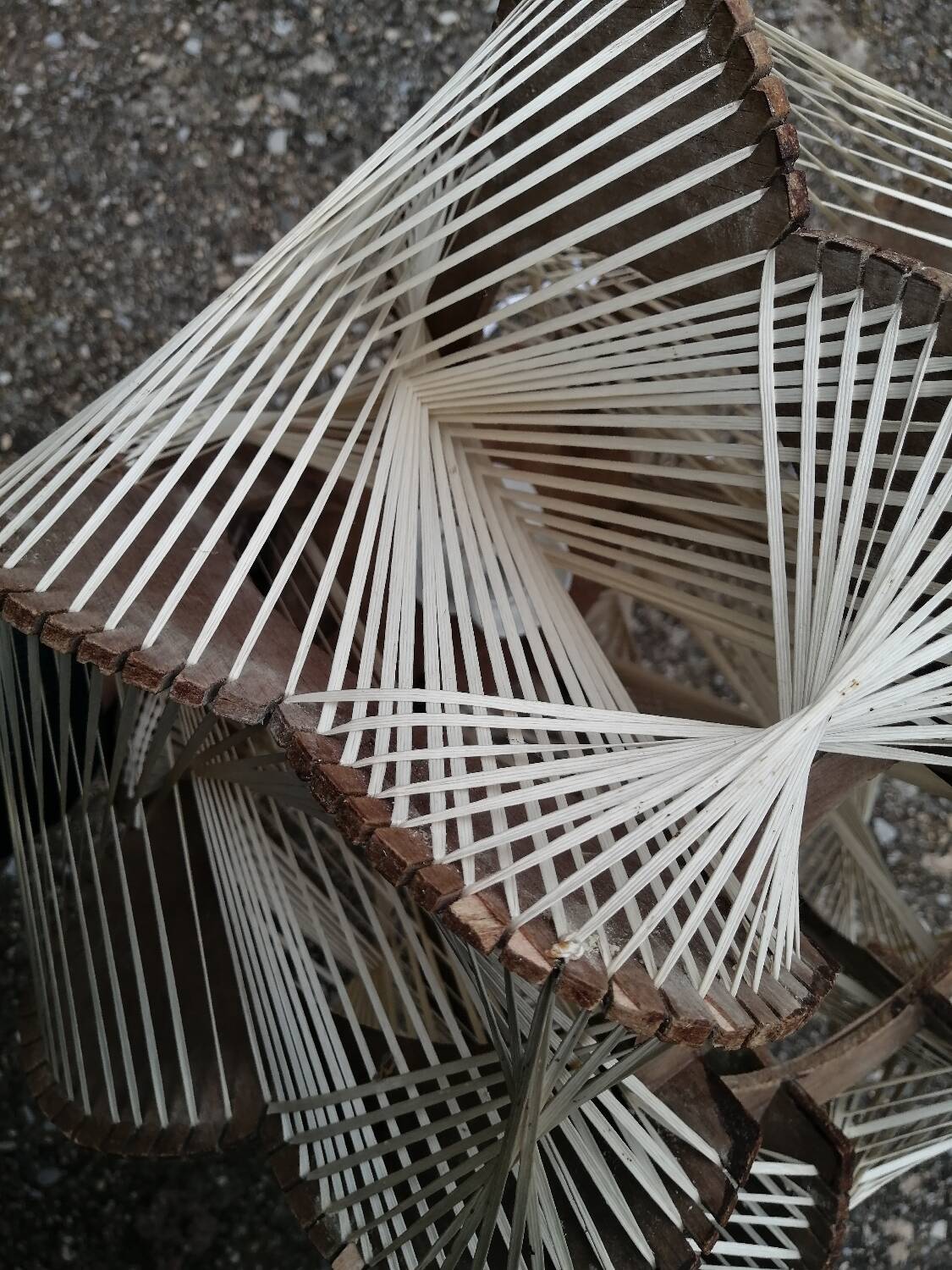 Pair of vintage wooden and rattan straw pendant lights.