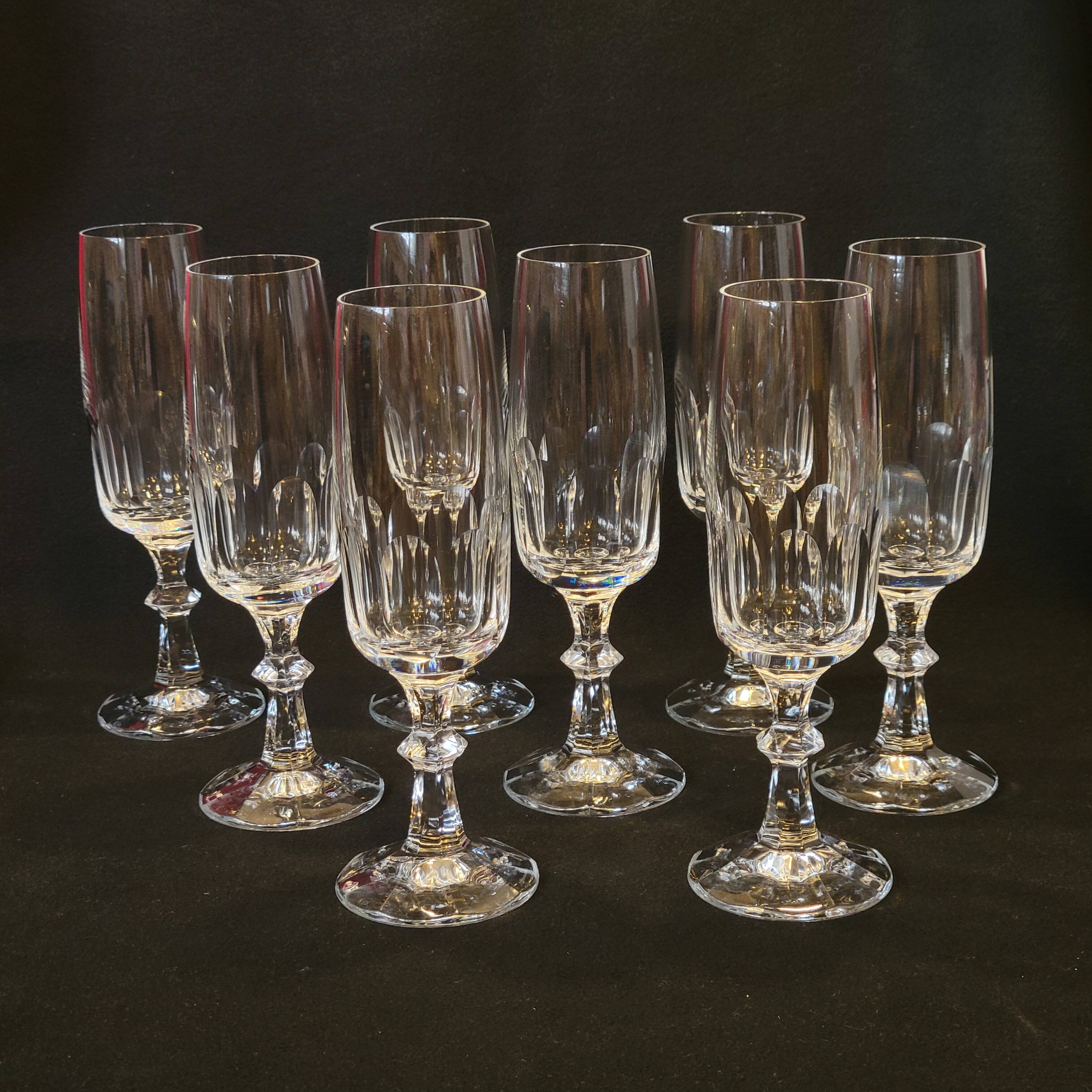 8 champagne flutes in flat cut crystal